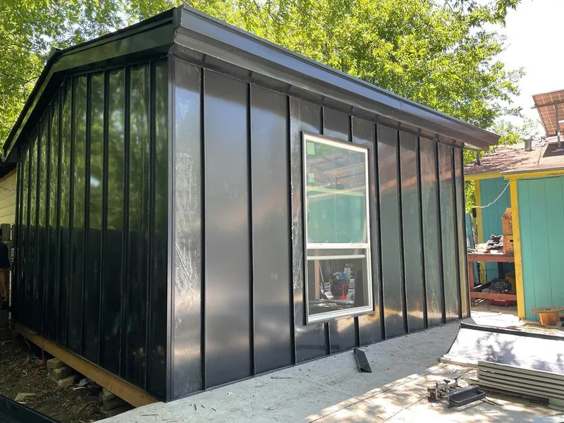 Black standing seam metal wall panels for Roof Inspection in Apple Valley