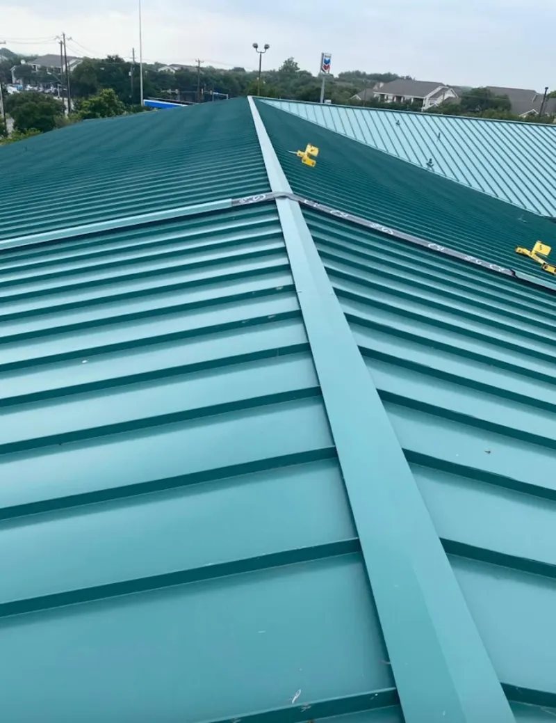 Green commercial metal roof ridge and valley for Metal Roof Repair in Apple Valley